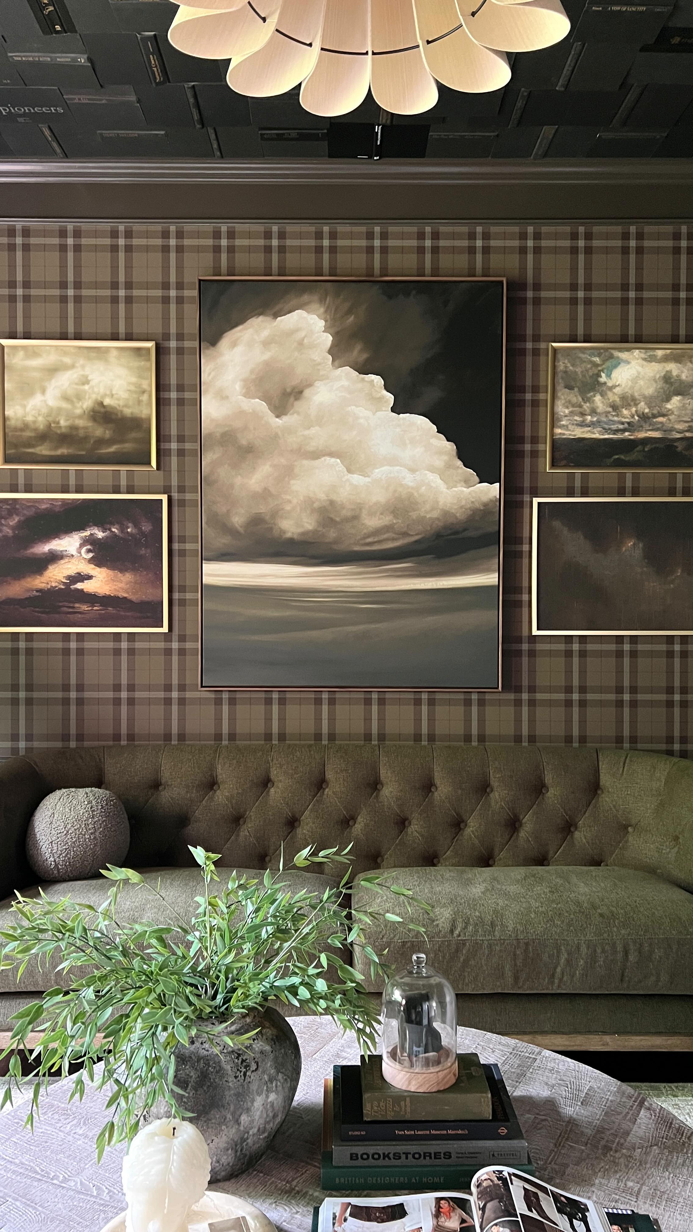 Art is personal. Sometimes you choose art for the sake of what it looks like. And sometimes it tells a bigger story. When designing this home office and browsing art online, I found myself really drawn to clouds. More specifically- moody clouds, where it looked like a storm was coming. I realized a gallery wall of my favorite pieces provided just the right atmosphere for curling up with a good book. Who doesnâ€™t like reading on a rainy day? A good combo with the book covers on the ceiling.ðŸ˜‰ Sourcesâž¡ï¸�https://liketk.it/43uGX